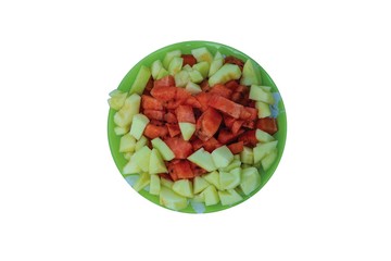 Close up view of colorful cut watermelon and melon dessert plate isolated. Healthy  eating concept. 