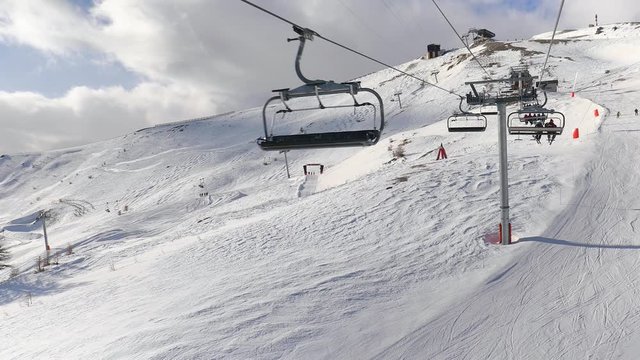 Using ski lift in the Alps