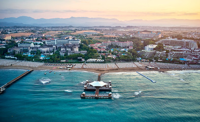 drone view of the beach with sun loungers