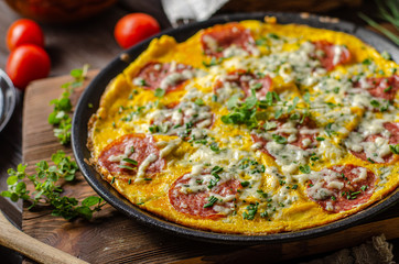 Omelette with salami and blue cheese