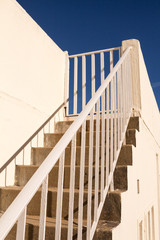 Stairs outdoors and a bright blue sky