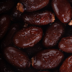 seeds of lychee with water drops background