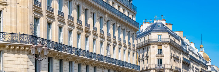 Paris, typical building, parisian facade and windows rue Auber