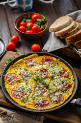 Omelette with salami and blue cheese