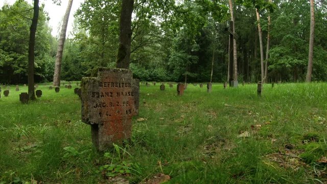 First World War German Soldiers And Victims Cemetery In The Forest. Pan Left