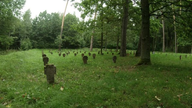 WWI German Soldiers And Victims Cemetery In The Forest. Pan Left