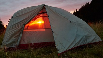 beautiful sunset in mountain meadow