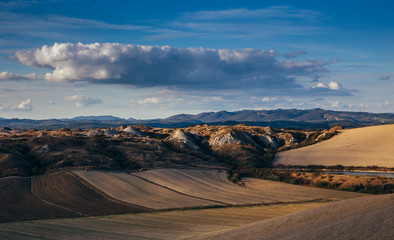 Fototapeta premium Rolling hills in autumn after harvest.