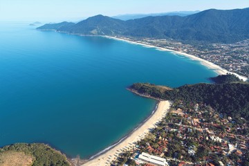 Obraz premium Aerial view of Maresias and Pauba Beaches, Sao Sebastiao, North Coast of Sao Paulo, Brazil. Vacation Travel. Travel destination. Tropical scenery. Great landscape