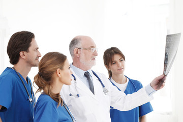 Medical team checking X-ray results