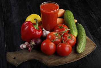 heap  of vegetables on wooden background