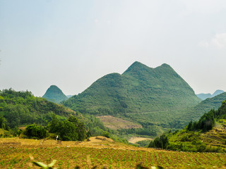 Countryside landscape with agriculture between Luoping and Duoyihe river in Yunnan province China. © Sven