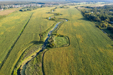banks of a swampy river, aerial view