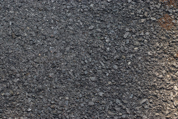 Texture of gray asphalt closeup