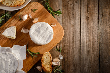 Camembert cheese, garlic, rosemary