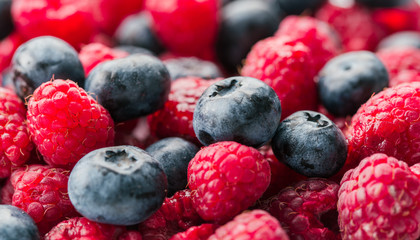 Fresh Summer Berries mix Background with Strawberry, Raspberry, Red currant, Blueberry and Blackberry.