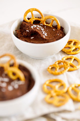 Healthy snack of homemade raw chocolate brownie dessert hummus made with chickpeas,cacao and...
