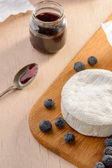 Soft cheese and blueberry jam