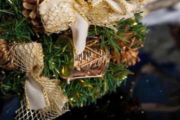 Christmas tree ball with decoration items closeup