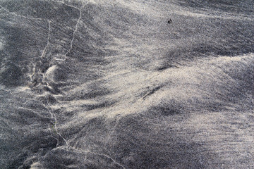 Black and white sand texture background with wave pattern