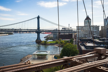 Manhattan Bridge next to the Brooklyn Bridge at the Brooklyn shore