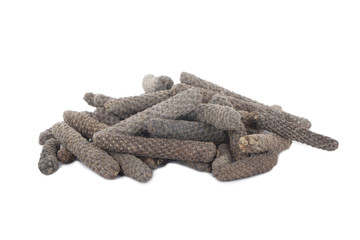 heap of pippali (long pepper) isolated on white background