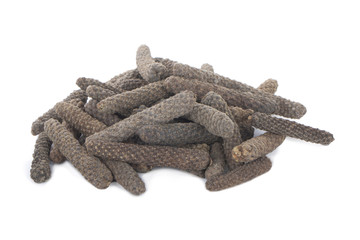 heap of pippali (long pepper) isolated on white background