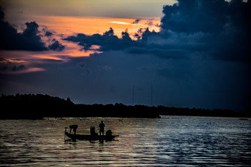 fishing on the lake at sunrise