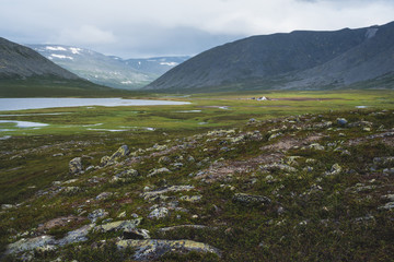 reindeer herders camp on the plain between the mountains