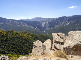 Fototapeta na wymiar Mountain landscape over Grotte del Bue Marino, Sardinia
