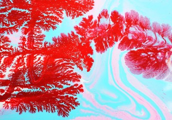 Abstract red and blue background. Freely flowing paint, coral pattern. Wallpaper, background, cover.