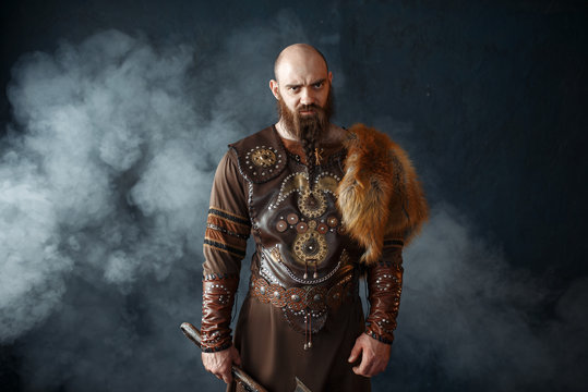 Bearded viking with axe, barbarian image