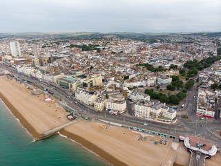 Fototapeta premium Aerial photo of the Brighton beach and coastal area located in the south coast of England UK that is part of the City of Brighton and Hove, taken on a bright sunny day