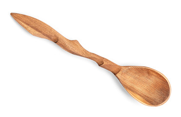 wooden spoon carved on isolated white background