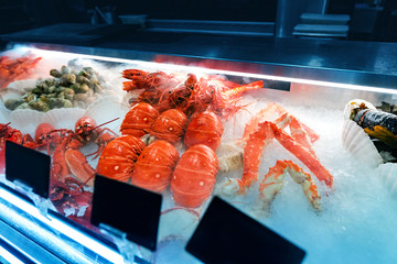 fresh seafood prawns and crawfish and lobsters for sale at the market. Healthy mediterranean...