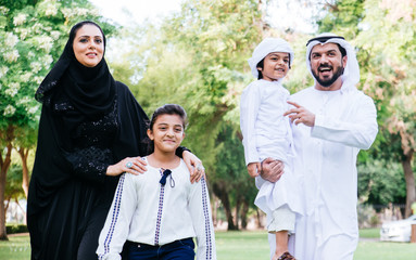 Arabian family spending time in a park