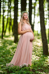 Young pregnant woman outdoor