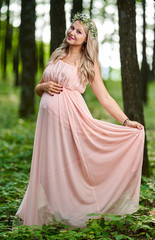 Young pregnant woman outdoor