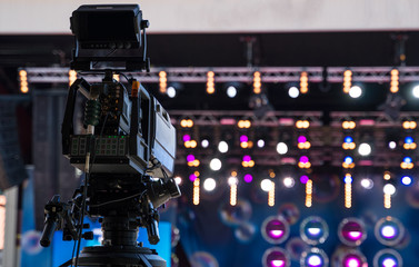 Professional video camera is ready to shoot the concert.