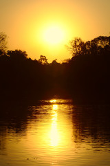 Fototapeta na wymiar Sunrise In Brazilian. Very beautiful, the sunrises in brazilian savannah has many colors.