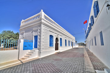 The ancient El Ghriba Synagogue located on the Tunisian island of Djerba - obrazy, fototapety, plakaty