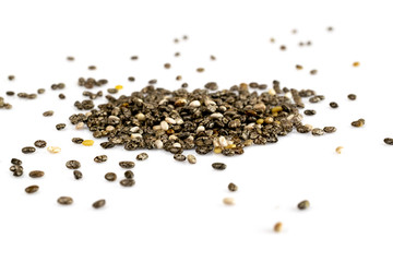 Pile of healthy chia seeds isolated on a white background. Healthy breakfast, vitamin snack, diet and healthy eating concept.