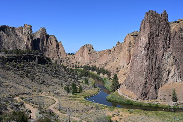 Smith Rock State Park and Crooked River near town of Terrebonne, Oregon on cloudless summer day.