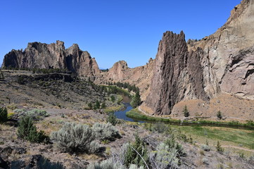 Smith Rock State Park and Crooked River near town of Terrebonne, Oregon on cloudless summer day.