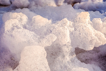 Obraz na płótnie Canvas White foam of an isolated soap to use as a background.