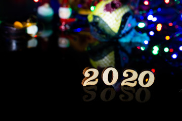 2020 happy new year wood number Christmas decoration and snow with bright background and copy space
