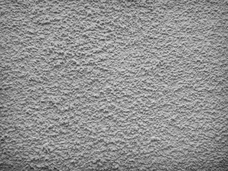 Texture of concrete wall with decorative plaster - photo. Color is gray.