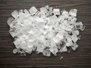 ice cubes on wooden table
