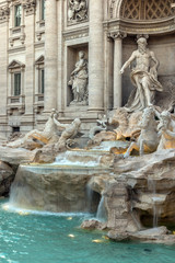 Fototapeta na wymiar Sunset view of Trevi Fountain in city of Rome, Italy