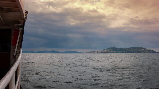 wide angle image from the boat in the sea with island